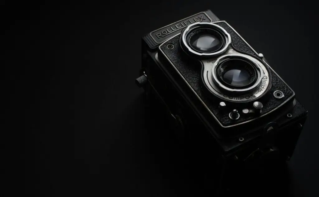 black Rolleiflex camera grayscale photo